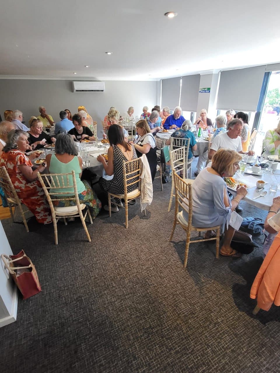 Guests gathered together at a Lightworkers Lunch at The Bridge House Hotel